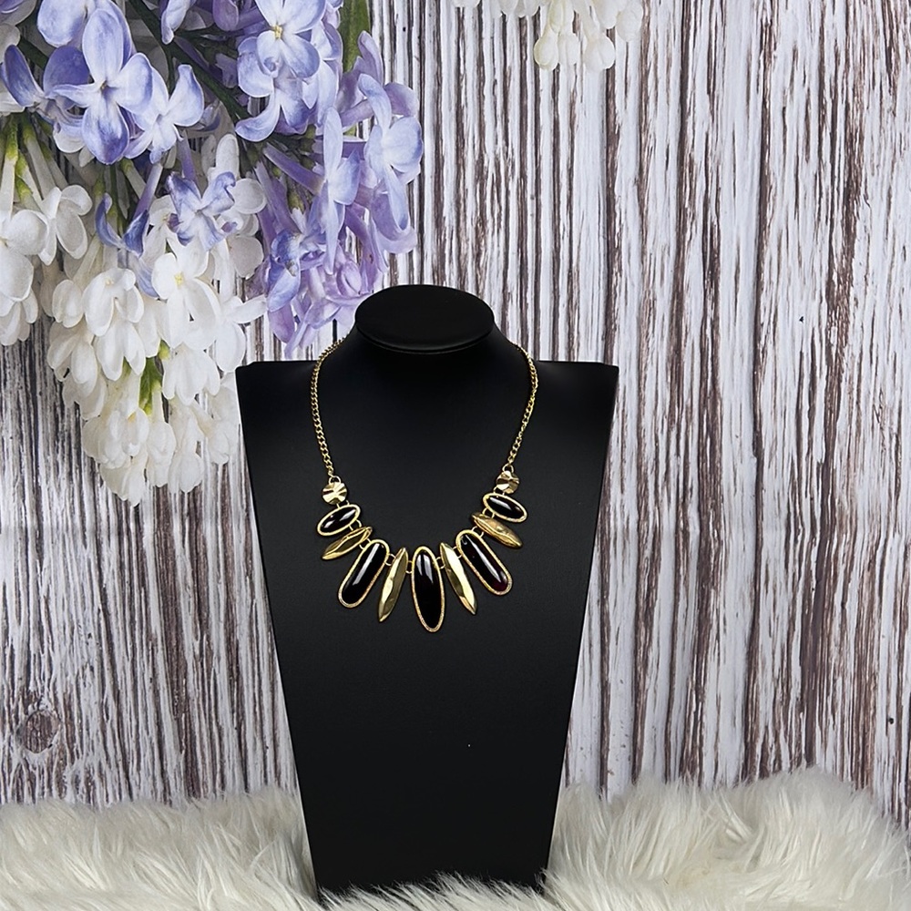 Statement necklace Gold finish and Rich purple tone.